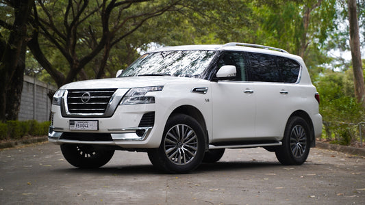 Nissan patrol white for rent in dubai